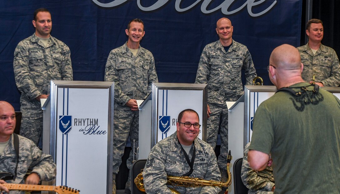 Grammy Award-winning saxophonist Jeff Coffin speaks to Airmen during a visit to the Rhythm in Blue jazz band at Joint Base Langley-Eustis, Virginia, Oct. 26, 2018. The Rhythm in Blue jazz band is one of seven ensembles from Air Combat Command’s Heritage of America Band. The band uses their music to tell the Air Force story throughout the Eastern United States, performing for diverse audiences from Maine to South Carolina. (U.S. Air Force photo by Tech. Sgt. Nick Wilson)