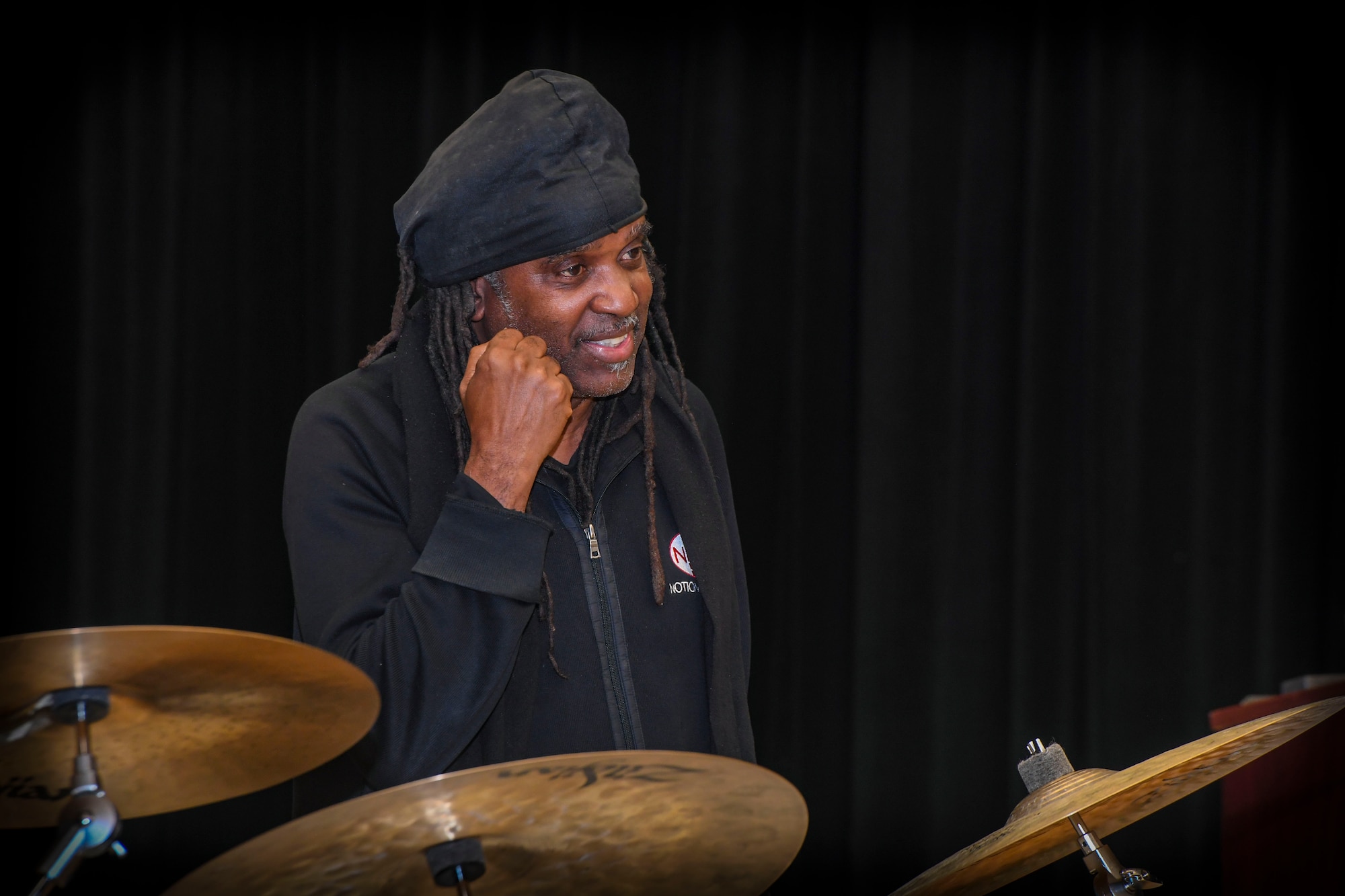 Musician Roy “Future Man” Wooten speaks during a visit to the Rhythm in Blue Jazz band at Joint Base Langley-Eustis, Virginia, Oct. 26, 2018. Wooten is internationally known as a percussionist for Bela Fleck and the Flecktones. He is also widely known for producing copntent that diversifies musical concepts and genres. (U.S. Air Force photo by Tech. Sgt. Nick Wilson)