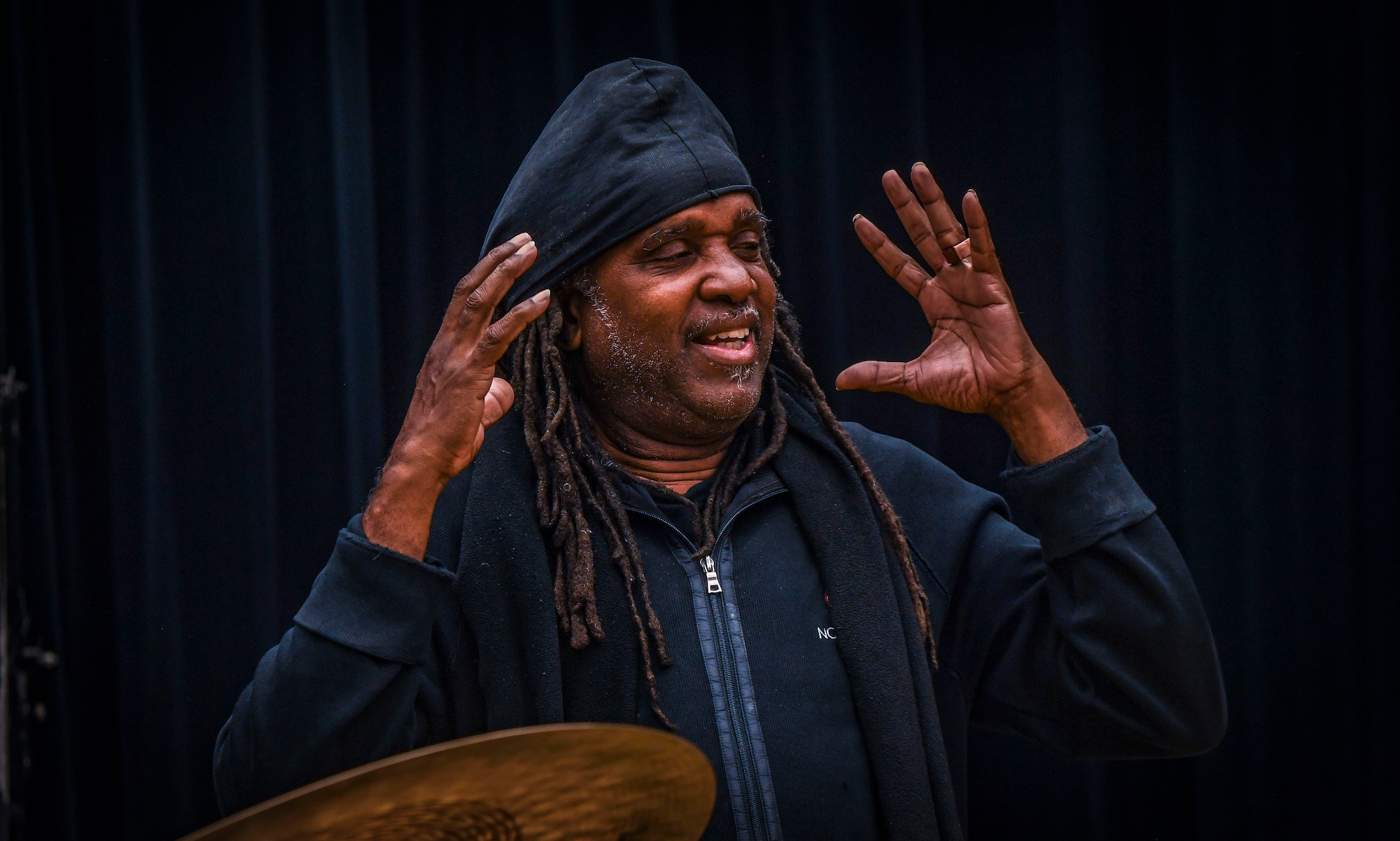 Five-time Grammy Award winner, composer, and percussionist Roy “Future Man” Wooten speaks during a visit to the Rhythm in Blue jazz band at Joint Base Langley-Eustis, Virginia, Oct. 26, 2018. Wooten lived and played music with his four brothers in the Hampton and Newport News area before his father, who is also a Korean War veteran, retired from the Air Force.  (U.S. Air Force photo by Tech. Sgt. Nick Wilson)