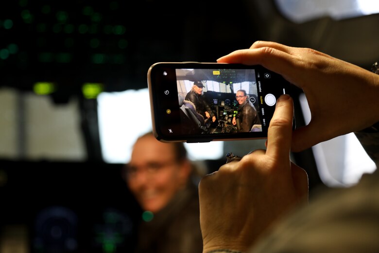 Lt. Col. Rachel Metzgar, a pilot assigned to 728 Airlift Squadron, shows Joe Walsh the flight deck of a C-17 Globemaster III on Joint Base Lewis-McChord, Wash., Nov. 7, 2018. Walsh was in the area for a concert benefiting military veterans. (U.S. Air Force photo by David L. Yost)