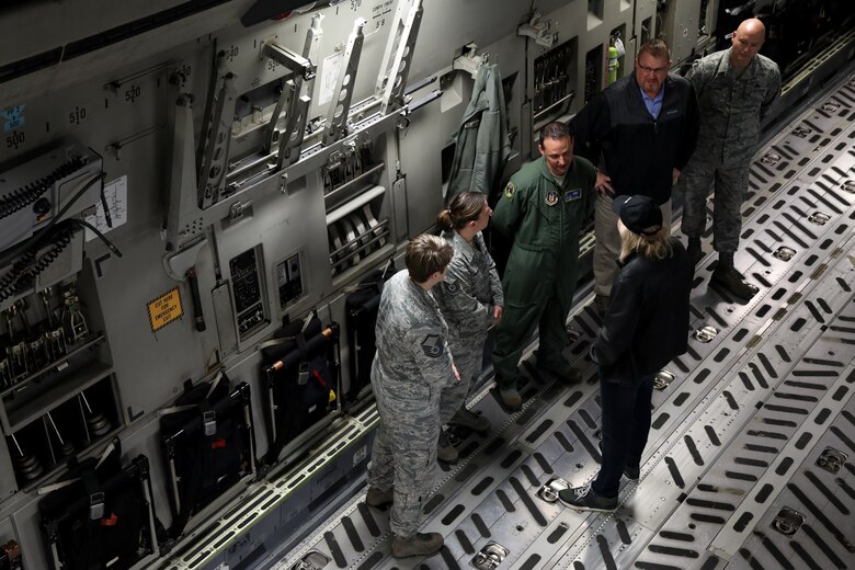 Joe Walsh speaks with personnel assigned to Joint Base Lewis-McChord, Wash., on Nov. 7, 2018. Walsh met with service members that work in different career fields during his visit. (U.S. Air Force photo by David L. Yost)