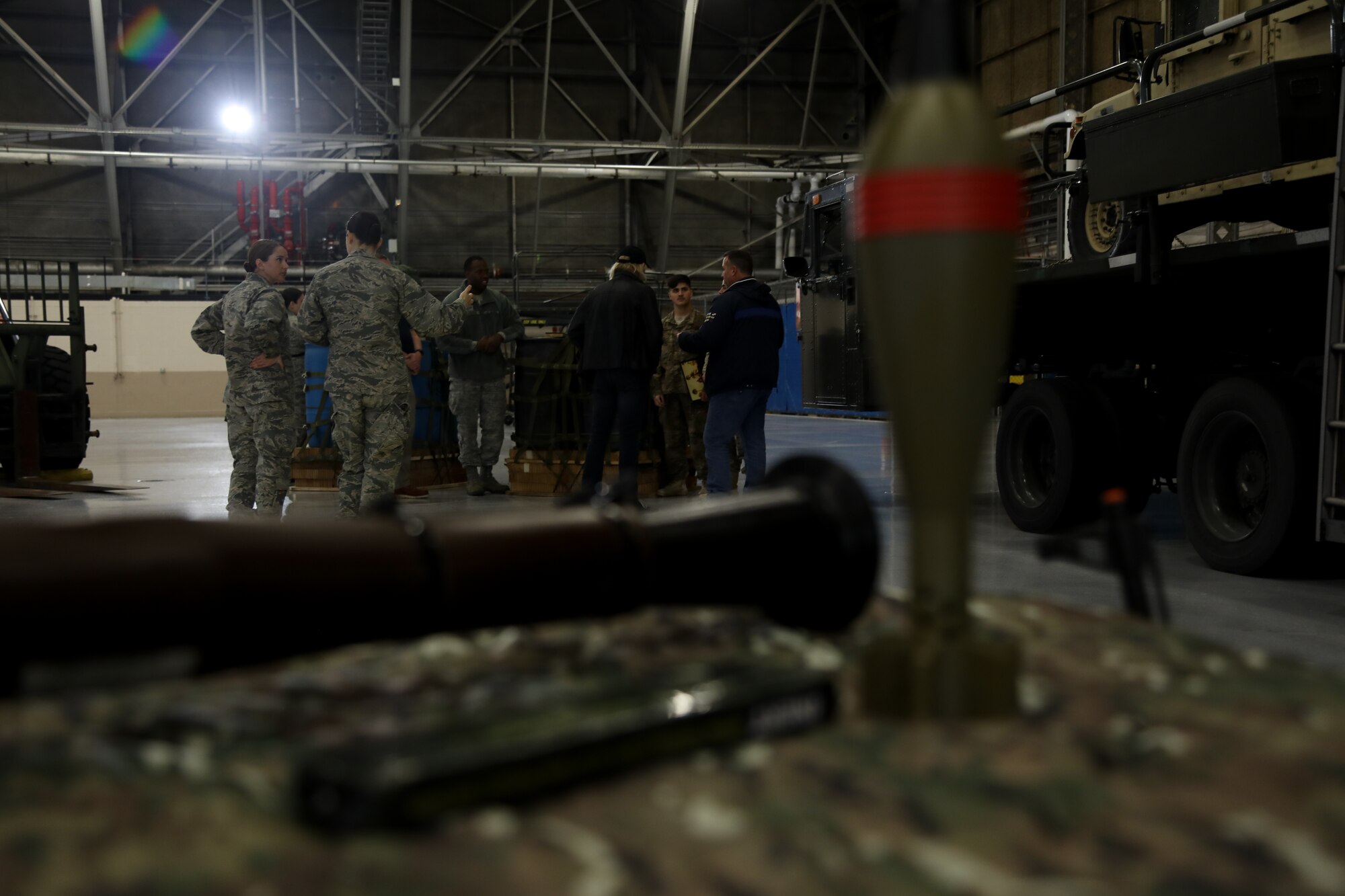 Joe Walsh speaks with personnel assigned to Joint Base Lewis-McChord, Wash., on Nov. 7, 2018. Walsh met with service members that work in different career fields during his visit. (U.S. Air Force photo by David L. Yost)