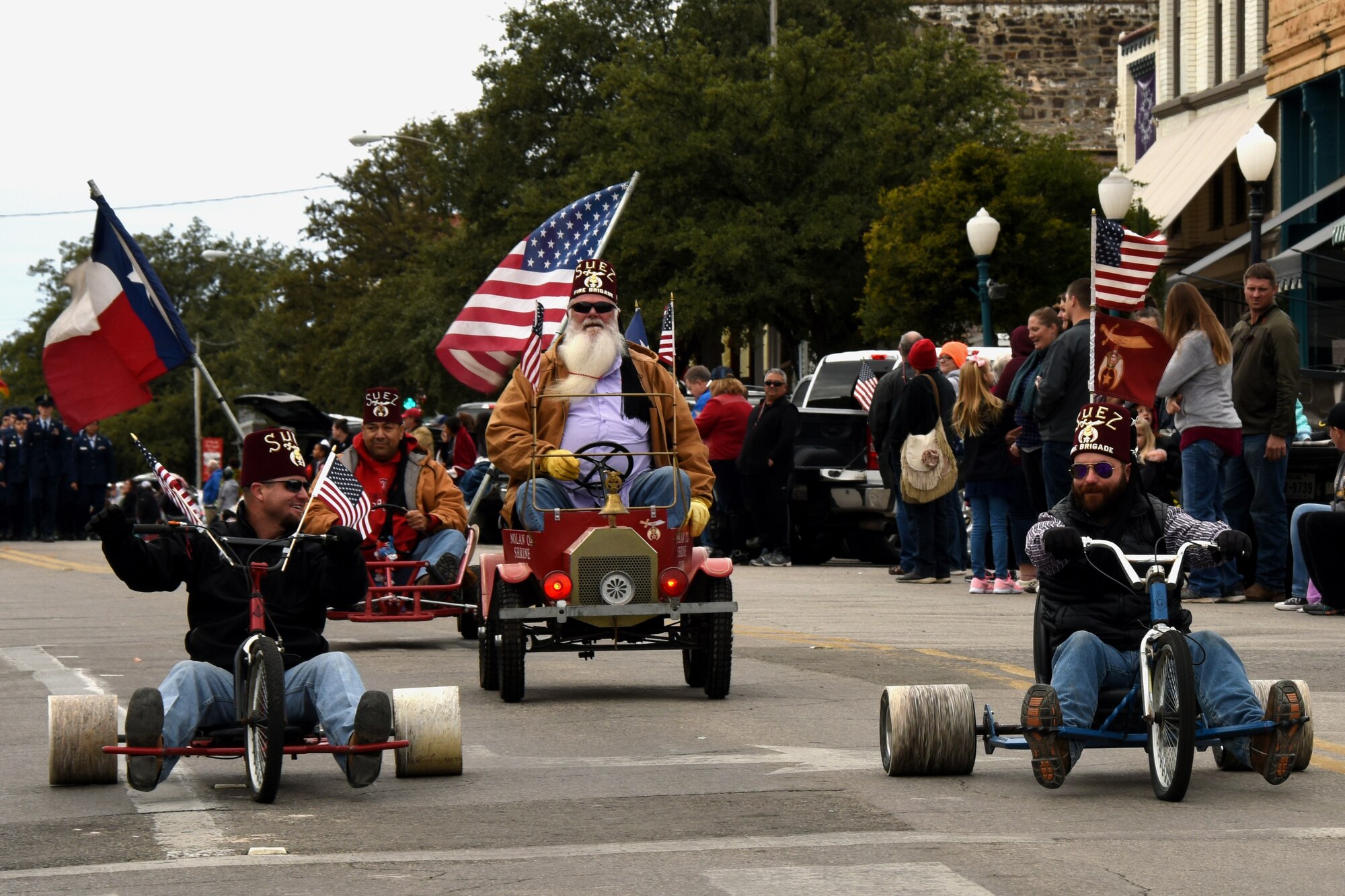 Members from the Suez Shriners, Concho Shrine Club, ride in the Veterans Day Parade in San Angelo, Texas, Nov. 10, 2018. Groups from San Angelo joined service members to show their support during the Veterans Day Parade. (U.S. Air Force photo by Airman 1st Class Zachary Chapman/Released)