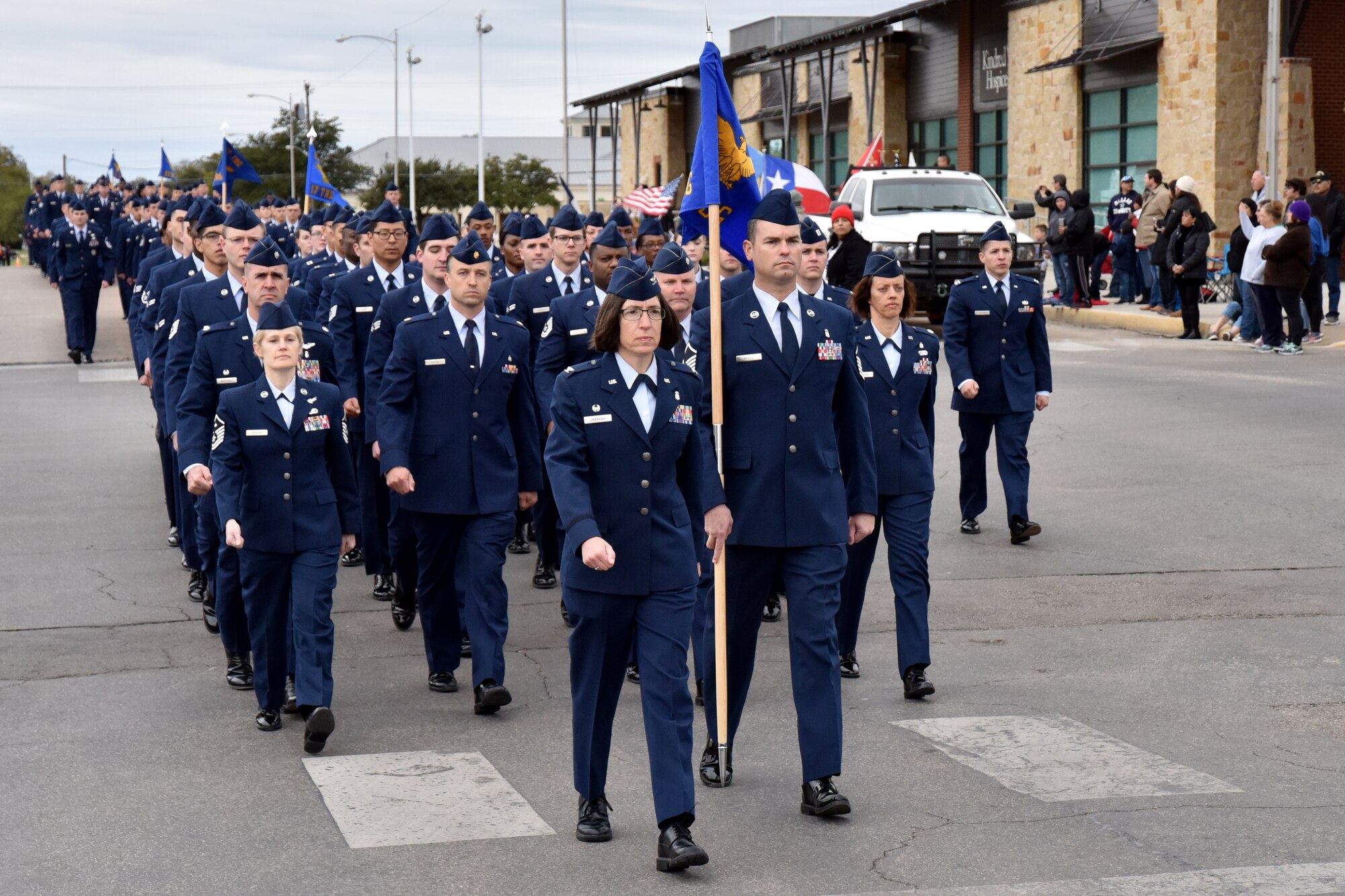 Airmen from the 17th Medical Group march in the Veterans Day Parade in San Angelo, Texas, Nov. 10, 2018. The parade featured veterans, active duty members and other organizations. (U.S. Air Force photo by 2nd Lt. Matthew Stott/Released)