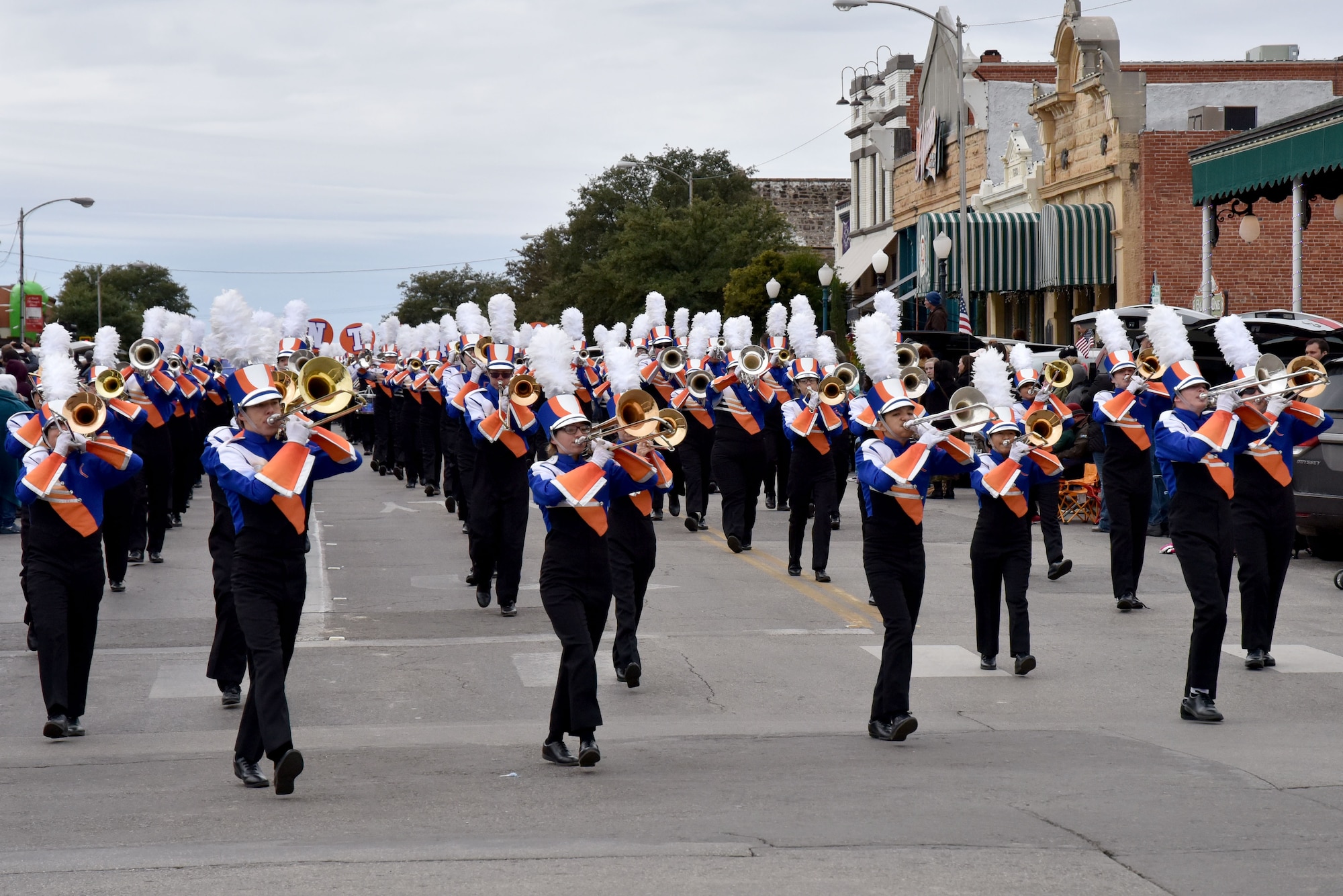 Members of the San Angelo Central High School Mighty Bobcat Band march and play their instruments in the Veterans Day Parade in San Angelo, Texas, Nov. 10, 2018. They were one of several bands that played during the parade. (U.S. Air Force photo by 2nd Lt. Matthew Stott/Released)