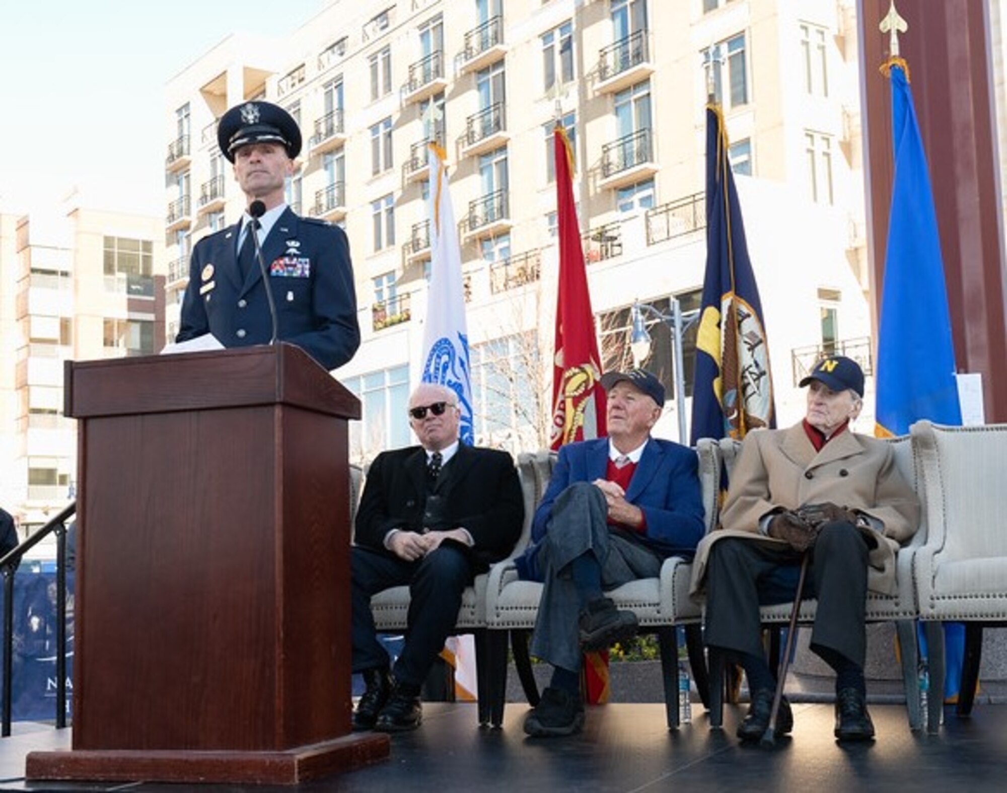 Featured speakers on the dais for Veterans Day event.