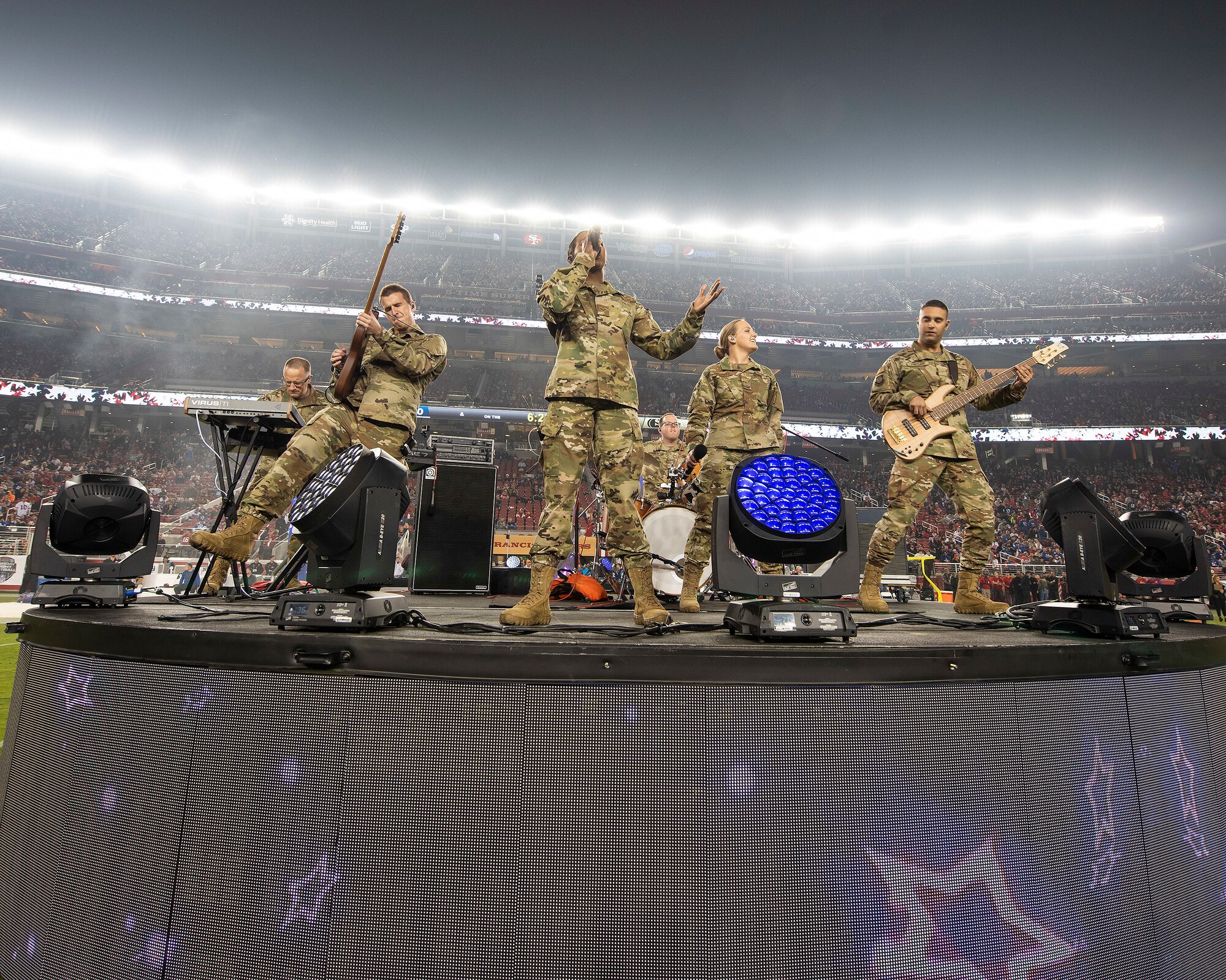The U.S. Air Force Band of the Golden West from Travis Air Force Base, California, perform during halftime of the San Francisco Forty-Niners and New York Giants Monday Night Football game at Levi’s Stadium in Santa Clara, California, Nov. 12, 2018. The band performed in honor of Veterans Day and to support the National Football League’s Salute to Service Campaign. (U.S. Air Force photo by Louis Briscese)