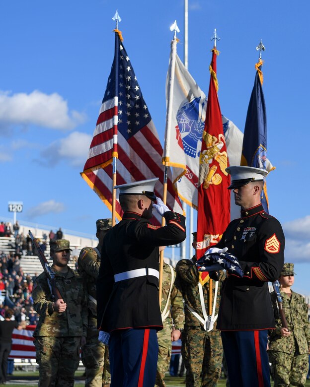 The U.S. Marine Corps color guard presents the colors before a football game at Old Dominion University in Norfolk, Virginia, Nov. 10, 2018.