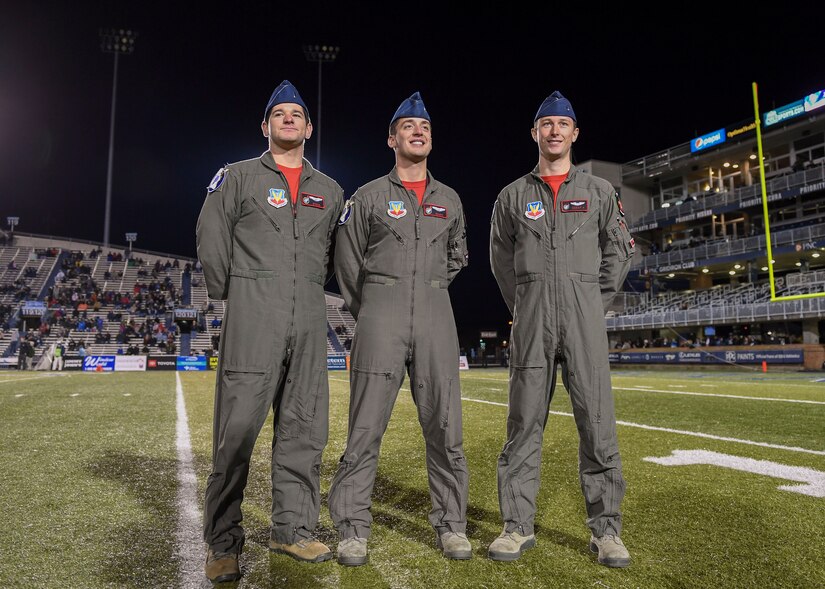 U.S. Air Force 1st Lts. Joshua ‘Steak’ Burdge and Michael ‘Chaff’ Koon, and 2nd Lt. Jacob Johnson, 71st Fighter Training Squadron pilots, are recognized during a Veterans’ Day tribute at Old Dominion University in Norfolk, Virginia, Nov. 10, 2018.
