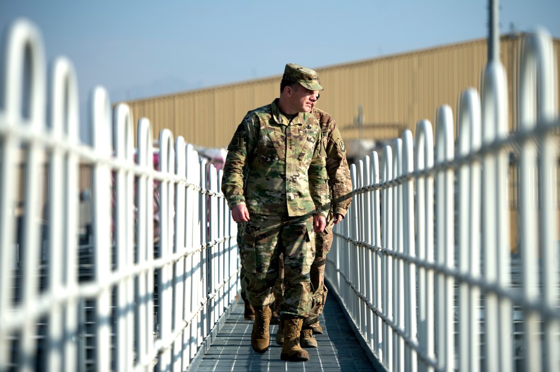U.S. Army Gen. Stephen Lyons, commander of U.S. Transportation Command, looks out at the cargo yard during a visit to Bagram Airfield, Afghanistan Nov. 11, 2018.