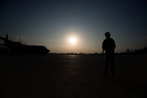 Airmen assigned to the 455th Expeditionary Security Forces Squadron provide fly away securty during a flight to Jalalabad Airfield, Afghanistan Nov. 10, 2018.