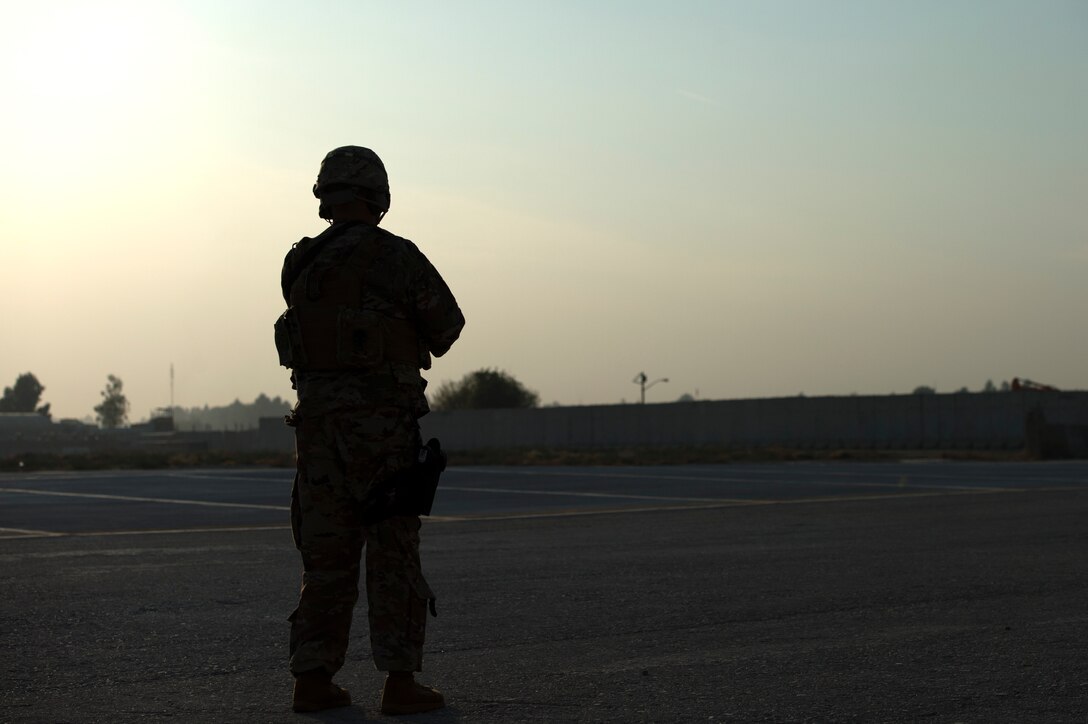 Airmen assigned to the 455th Expeditionary Security Forces Squadron provide fly away securty during a flight to Jalalabad Airfield, Afghanistan Nov. 10, 2018.