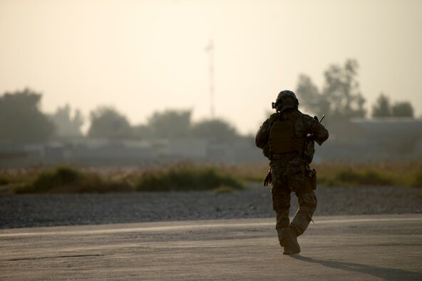 Airmen assigned to the 455th Expeditionary Security Forces Squadron provide fly away securty during a flight to Jalalabad Airfield, Afghanistan Nov. 10, 2018.