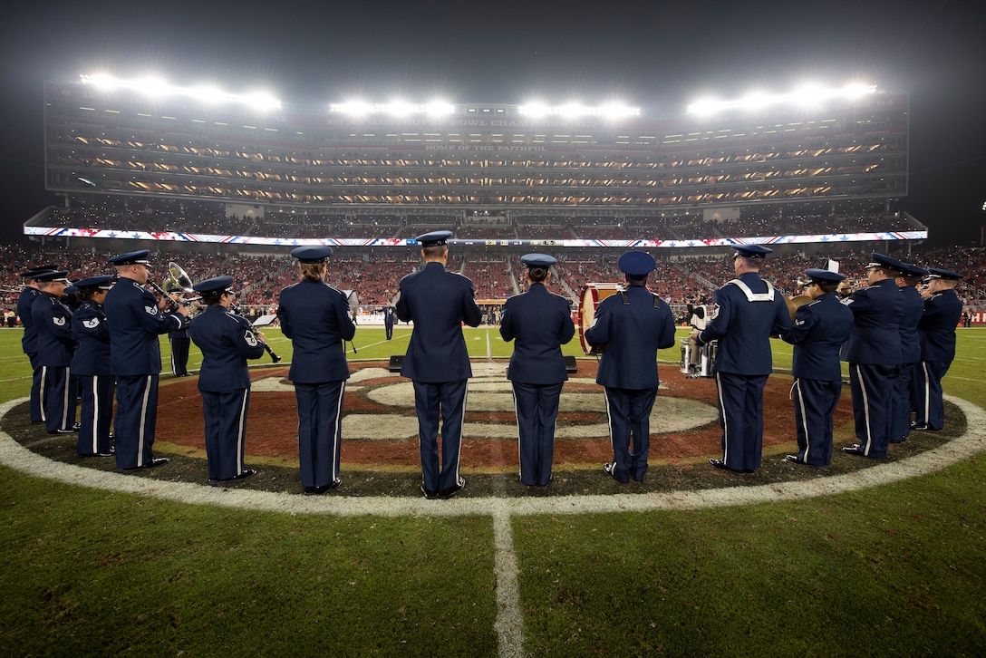 The U.S. Air Force Band of the Golden West from Travis Air Force Base, California, perform during halftime of the San Francisco Forty-Niners and New York Giants Monday Night Football game at Levi’s Stadium in Santa Clara, California, Nov. 12, 2018. The band performed in honor of Veterans Day and to support the National Football League’s Salute to Service Campaign. (U.S. Air Force photo by Louis Briscese)