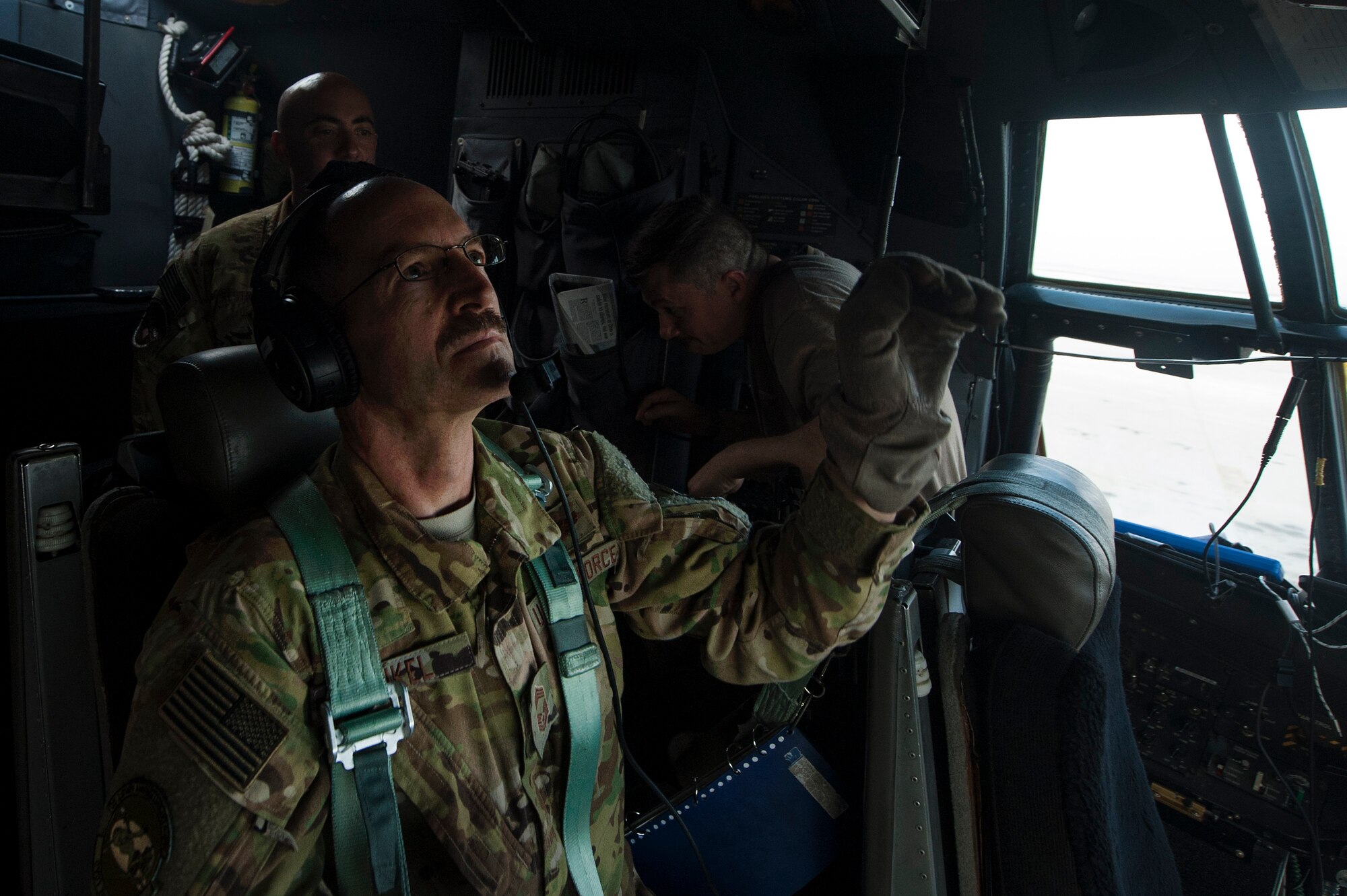 U.S. Air Force Chief Master Sgt. Kenneth Kunkel, 746th Expeditionary Airlift Squadron C-130 Hercules flight engineer, conducts a pre-flight inspection for a C-130 Hercules prior to launch Nov. 13, 2018, at Al Udeid Air Base, Qatar. Kunkel reached 10,000 flying hours Oct. 6, a number considered prestigious amongst military aviators. (U.S. Air Force photo by Tech. Sgt. Christopher Hubenthal)