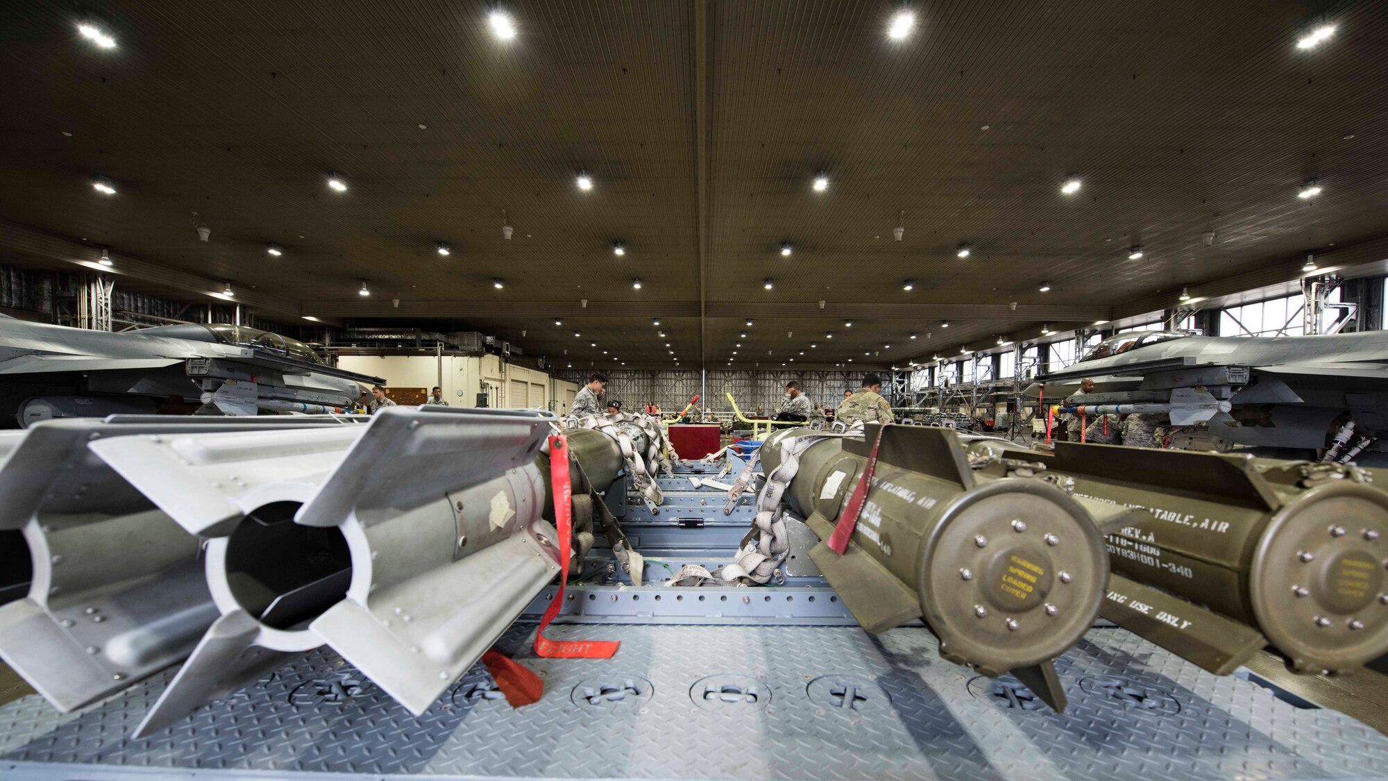 Armaments sit on a stationary platform during the third quarter load competition at Misawa Air Base, Japan, Nov. 9, 2018. During the competition Airmen raced against the clock to see which team could accurately and efficiently load munitions onto an F-16 Fighting Falcon. (U.S. Air Force photo by Airman 1st Class Collette Brooks)