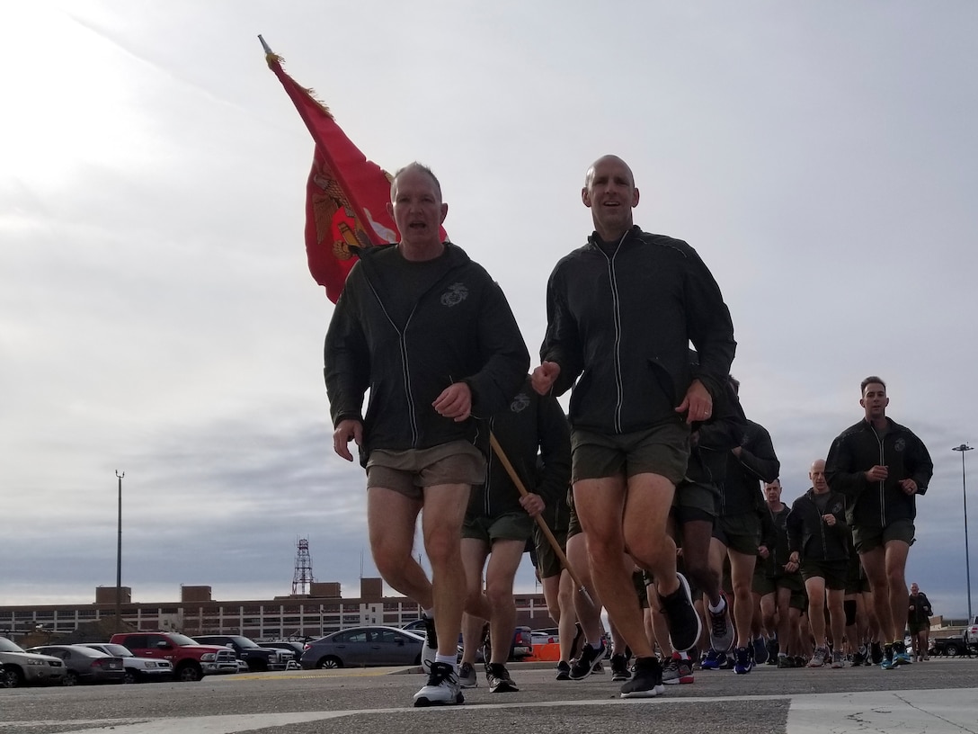 U.S. Marine Corps Lt. Gen. Mark A. Brilakis, commanding general of U.S. Marine Corps Forces Command, left, and Col Thomas H. Campbell III, commanding officer of Headquarters and Service Battalion, MARFORCOM, lead the MARFORCOM 243rd Marine Corps birthday run Nov. 8, 2018, at Naval Station Norfolk, Norfolk, Virginia. The run was held in celebration of the 243rd Marine Corps birthday and to commemorate the 100 year anniversary of the end of World War I. (U.S. Marine Corps photo by Sgt. Jessika Braden/Released)
