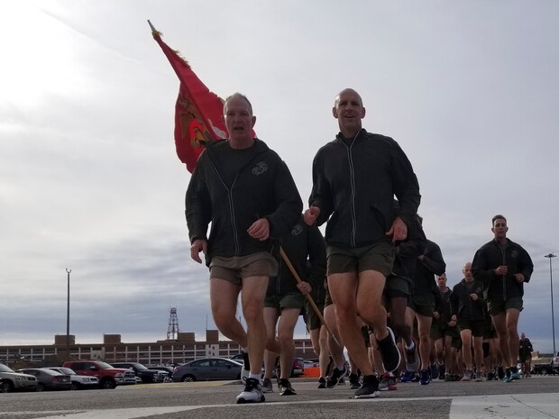 Lt. Gen. Mark A. Brilakis, commanding general of U.S. Marine Corps Forces Command, left, and Col Thomas H. Campbell III, commanding officer of Headquarters and Service Battalion, MARFORCOM, lead the MARFORCOM 243rd Marine Corps birthday run Nov. 8, 2018, at Naval Station Norfolk, Norfolk, Virginia. The run was held in celebration of the 243rd Marine Corps birthday and to commemorate the 100 year anniversary of the end of World War I. (U.S. Marine Corps photo by Sgt. Jessika Braden/Released)