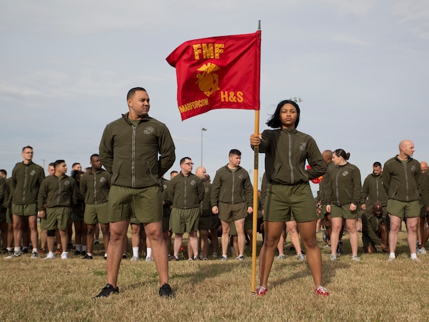 U.S. Marines and Sailors with U.S. Marine Corps Forces Command stand in formation prior to the commencement of the MARFORCOM 243rd Marine Corps birthday run Nov. 8, 2018, at Naval Station Norfolk, Norfolk, Virginia. The run was held in celebration of the 243rd Marine Corps birthday and to commemorate the 100 year anniversary of the end of World War I.  (U.S. Marine Corps photo by Sgt. Jessika Braden/Released)