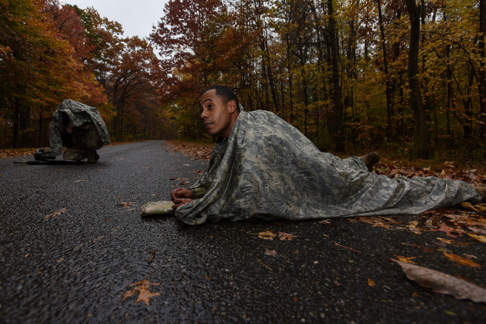 Sgt. 1st Class Andre Mangual, U.S. Army NCO Academy senior small group leader, maps out his route during the land navigation portion of the 2018 Service Member of the Year Competition on Joint Base McGuire-Dix-Lakehurst, New Jersey, Nov. 5, 2018. The competition is a joint service event that encourages military branches to work together and boost morale. (U.S. Air Force photo by Airman 1st Class Ariel Owings)