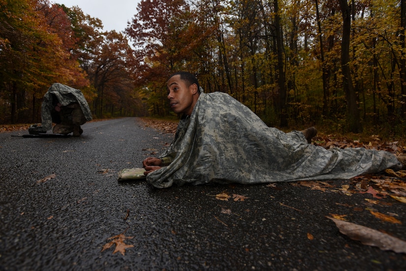Sgt. 1st Class Andre Mangual, U.S. Army NCO Academy senior small group leader, maps out his route during the land navigation portion of the 2018 Service Member of the Year Competition on Joint Base McGuire-Dix-Lakehurst, New Jersey, Nov. 5, 2018. The competition is a joint service event that encourages military branches to work together and boost morale. (U.S. Air Force photo by Airman 1st Class Ariel Owings)