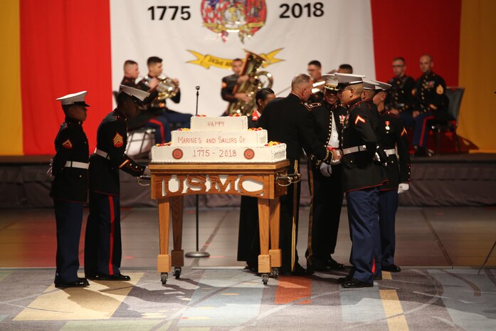U.S. Marines participate in the Marine Corps birthday cake cutting ceremony during the 243rd Marine Corps birthday ball Nov. 3, 2018 at the Virginia Beach Convention Center, Virginia Beach, Virginia. Each year Marines commemorate the Marine Corps Birthday by reflecting on its rich traditions through the reading of General John A. Lejeune’s Birthday Message and the cutting of the birthday cake. (U.S. Marine Corps photo by Lance Cpl. Garett Burns/Released)
