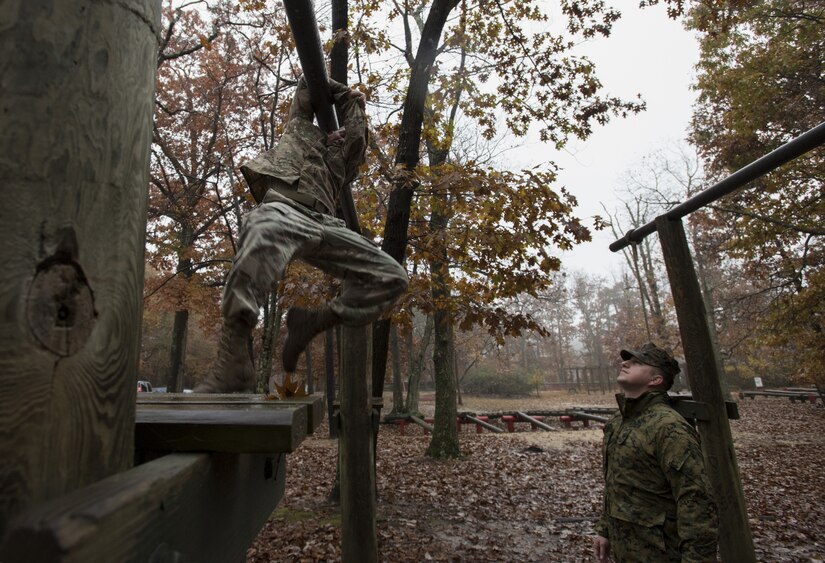 Sgt. 1st Class Mark Padifeld, 174th Infantry Brigade, 3rd Battalion, 314th Field Artillery Regiment fire support NCO observer and coach, run an obstacle course during the 2018 Service Member of the Year Competition on Joint Base McGuire-Dix-Lakehurst, New Jersey, Nov. 6, 2018. Competitors were awarded points based on their performance and time in each obstacle. (U.S. Air Force photo by Airman 1st Class Ariel Owings)