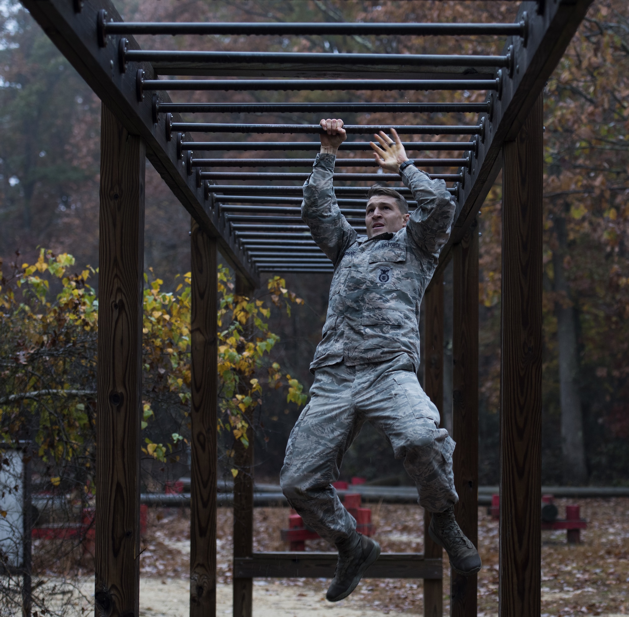 U.S. Air Force Staff Sgt. Morgan D. McDaniel, 514th Security Forces Squadron Phoenix Raven, completes an obstacle course during the 2018 Service Member of the Year Competition on Joint Base McGuire-Dix-Lakehurst, New Jersey, Nov. 6, 2018. With four services and eight competitors, the three day competition tested the knowledge, endurance and skills of the individuals with multiple challenges throughout each day. (U.S. Air Force photo by Airman 1st Class Ariel Owings)