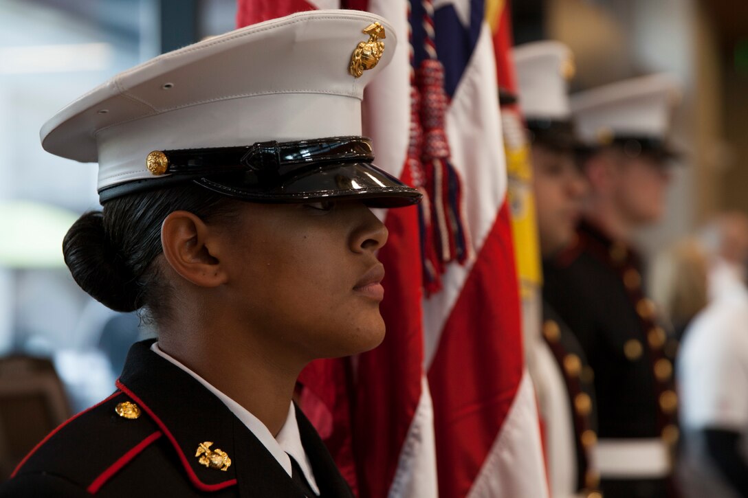 Private First Class Georgina Lewis, administrative clerk with 4th Marine Logistics Group, serves in the color guard before a wheelchair basketball game at the Southeast Veteran’s Hospital in New Orleans, Nov. 11, 2018.