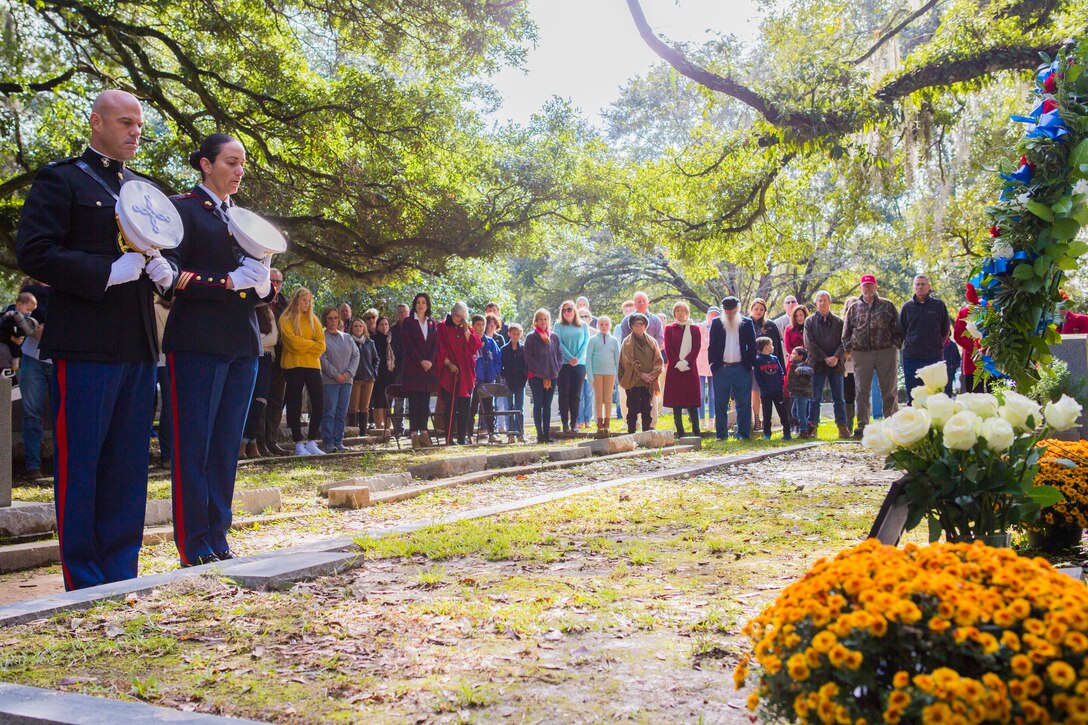Family and service members pray during a wreath laying ceremony for Gen. Robert H. Barrow, 27th Commandant of the Marine Corps, at the Grace Episcopal Church of West Feliciana in St. Francisville, La., Nov. 10, 2018.
