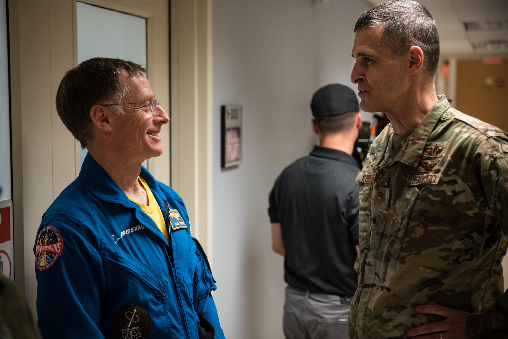 Brig. Gen. Mark Koeniger, 711th Human Performance Wing commander, speaks with Boeing astronaut Chris Ferguson during the two-day astronaut testing in the 711HPW’s centrifuge Nov. 1 and 2.