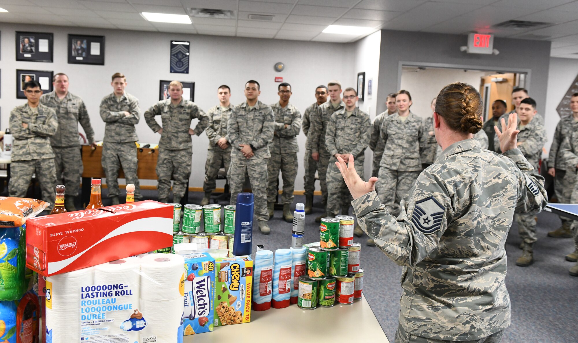 Airmen from Ellsworth Air Force Base, S.D., build care packages to help aid the hurricane relief and reconstruction effort at Tyndall AFB, Fla., Nov. 1, 2018. The care packages were filled with essential items such as toiletries, shoe insoles and non-perishable snacks. (U.S. Air Force photo by Airman 1st Class Thomas I. Karol)