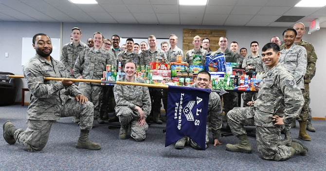 Airmen from Ellsworth Air Force Base, S.D., gather to prepare care packages to assist in the hurricane recovery and reconstruction efforts at Tyndall AFB, Fla., Nov. 1, 2018. The idea for the care packages was brought up by Senior Airman Lionel Gittens, a 28th Maintenance Squadron weapons loader, as part of an Airman Leadership School community involvement project. (U.S. Air Force photo by Airman 1st Class Thomas I. Karol)