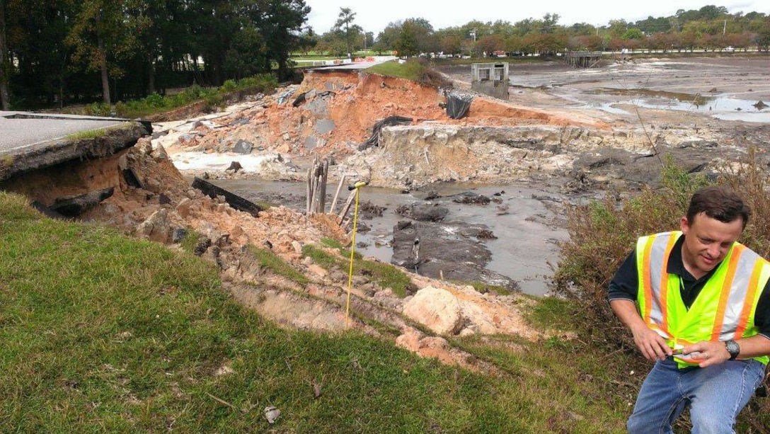 Mitch Hall, Wilmington District Chief of Geotechnical and Dam Safety Section, takes notes to assist with design and construction of repairs to Semmes Lake Dam at Fort Jackson, SC in 2015. (Please see article in lower right corner of this page under News Stories.)