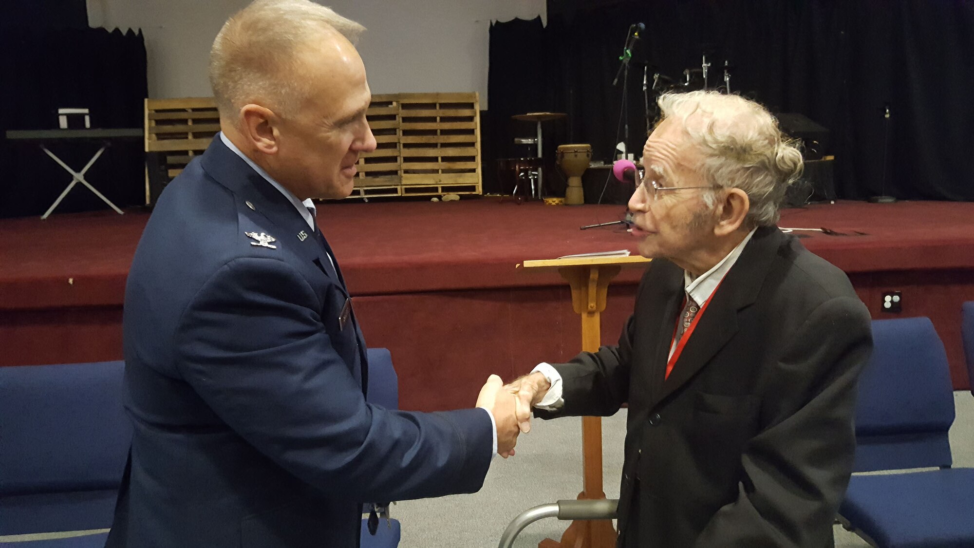 Col. Jay Smeltzer, commander of the 445th Maintenance Group, greets Keith McMurray, a WWII veteran at the City of Fairborn’s Veterans Day Ceremony held at the Fairborn United Methodist Church November 10, 2018.