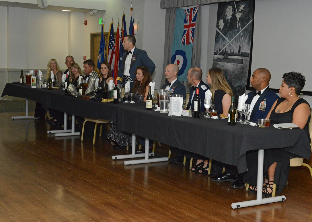 Base leadership joined leaders of the Royal Air Force at the head table at the Battle of Britain Night at Club Muroc Nov. 9. Patrons were treated to dinner and beverages to commemorate the World War II battle, which lasted July 10 to October 31, 1940. (U.S. Air Force photo by Kenji Thuloweit)