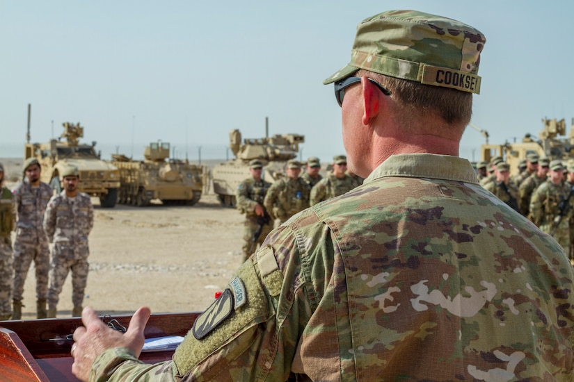 U.S. Army Lt. Col. Christopher W. Cooksey, commander of 2nd Battalion, 198th Armor Regiment, 155th Armored Brigade Combat Team, Mississippi Army National Guard, addresses U.S. and Qatari military forces at the opening ceremony of Exercise Eastern Action 2019, Nov. 4, 2018. Eastern Action is a U.S. Army Central led exercise conducted between U.S. and Qatari military forces to enhance interoperability and demonstrate our commitment to long-term stability in the region.