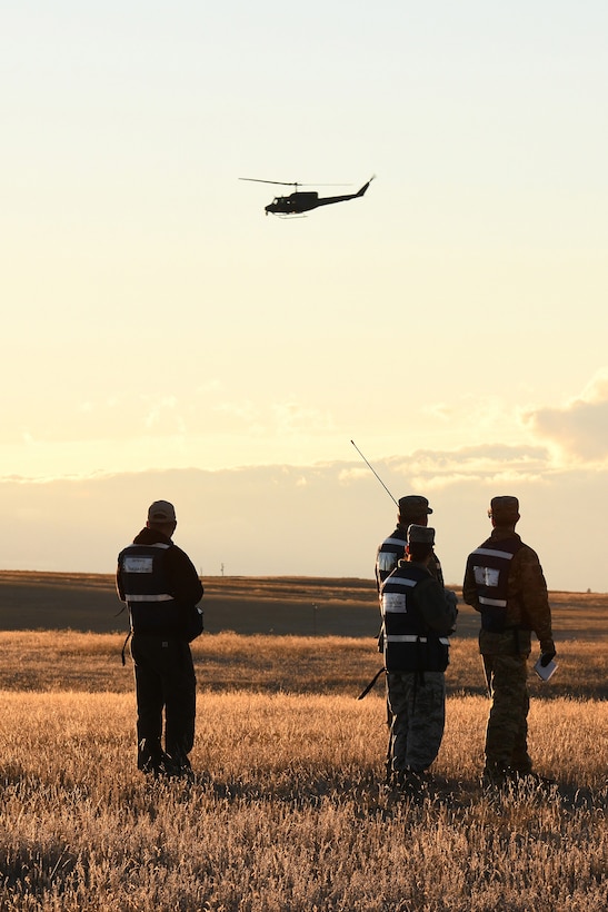 Members of the 341st Missile Wing Inspector General team watch as the 341st Security Forces Group practice a launch facility recapture during Global Thunder 19, Oct. 30, 2018, at Malmstrom Air Force Base, Mont.