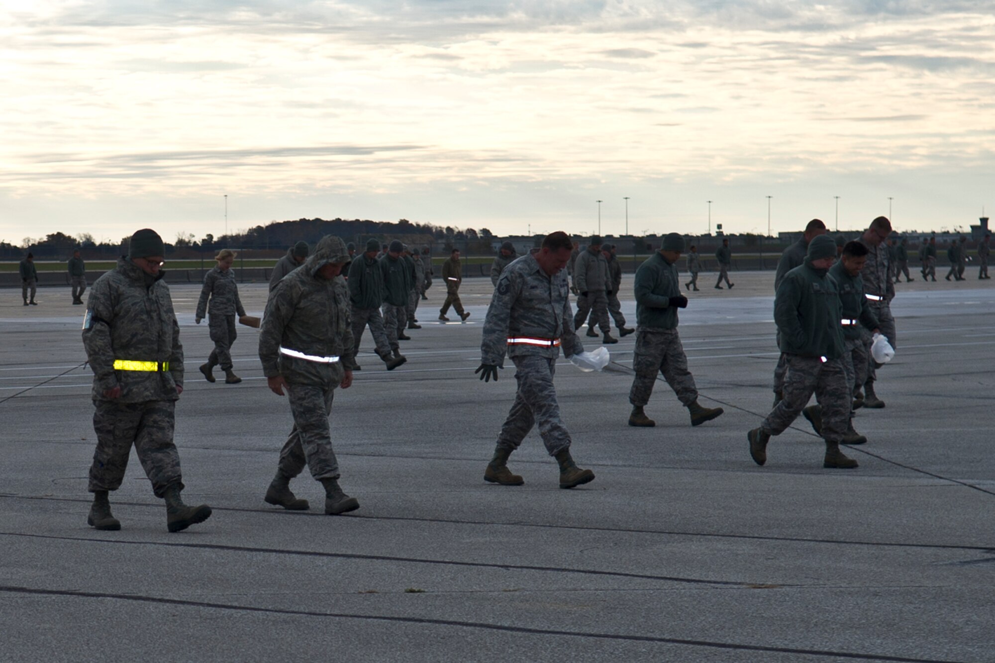Airmen with the 434th Maintenance Group search the flightline for foreign object debris at Grissom Air Reserve Base, Ind., Nov. 4, 2018 on the flightline. Airmen found close to one pound of litter that was weighed and discarded by Quality Assurance Inspectors. 
(U.S. Air Force photo by Staff Sgt. Courtney Dotson-Essett)