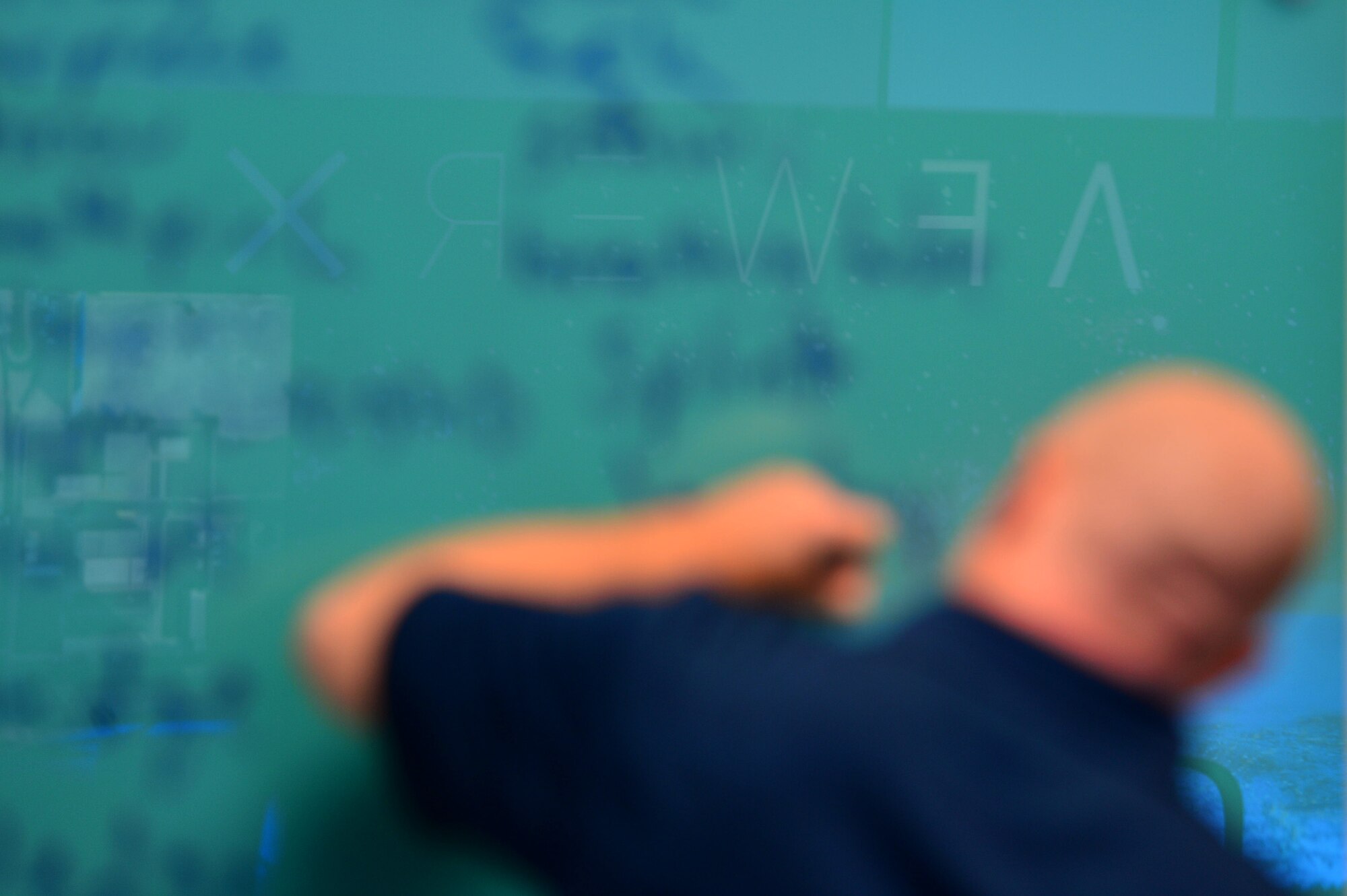 Airmen from the 432nd Wing/432nd Air Expeditionary Wing and the 799th Air Base Group list the various uses of a pen during a spark cell workshop at AFWERX-Las Vegas Nov. 5, 2018. AFWERX was envisioned by Secretary of the Air Force Heather Wilson to solve some of the toughest challenges that the Air Force faces through innovation and collaboration alongside the nation’s top subject matter experts. (U.S. Air Force Photo by Airman 1st Class Haley Stevens)