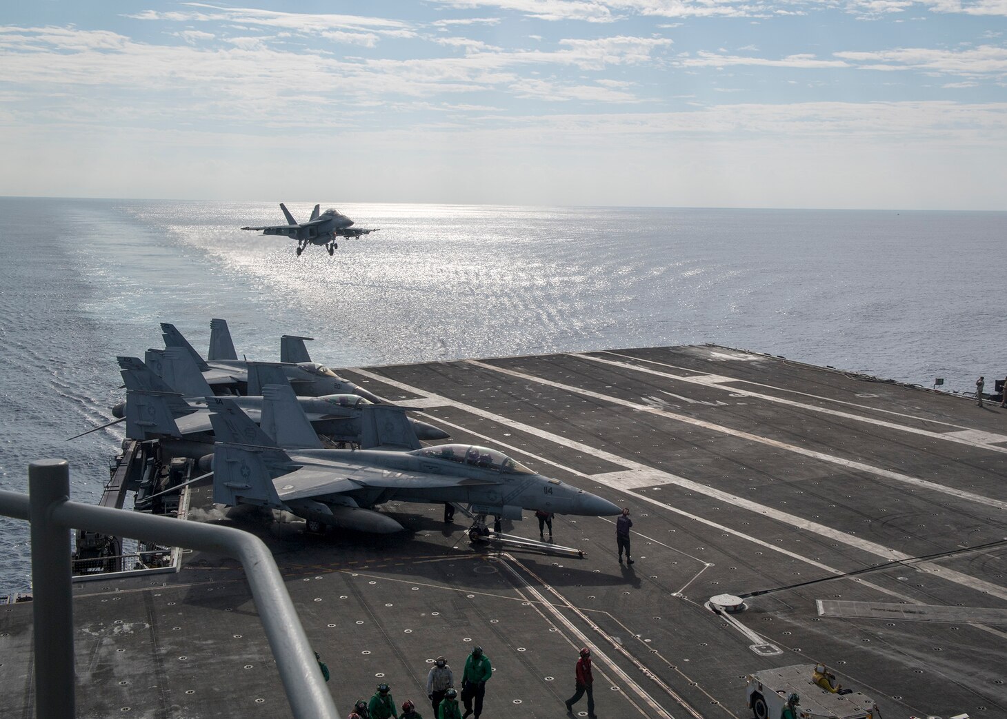 PHILIPPINE SEA (Nov. 13, 2018) An F/A-18 Super Hornet, assigned to the “Black Aces” of Strike Fighter Squadron (VFA) 41, from Carrier Air Wing 9, approaches for a landing on the flight deck of the aircraft carrier USS Ronald Reagan (CVN 76). USS Ronald Reagan and USS John C. Stennis (CVN 74) are underway and conducting operations, in international waters as part of a dual carrier strike force exercise. The U.S. Navy has patrolled the Indo-Pacific region routinely for more than 70 years promoting regional security, stability, and prosperity.