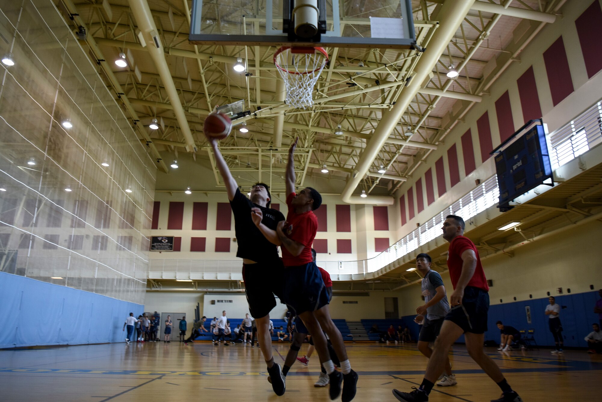 Republic of Korea Air Force Corporal Lee Gun Woo, 111th Fighter Squadron Charge of Quarters, shoots a basket during the 2018 US-ROKAF Friendship Day at Kunsan Air Base, Republic of Korea, Nov. 9, 2018. The US-ROKAF Friendship Day focused on celebrating the partnership and alliance between the 8th Fighter Wing and 38th Fighter Group, who participated in several events throughout the day. (U.S. Air Force photo by Senior Airman Savannah L. Waters)