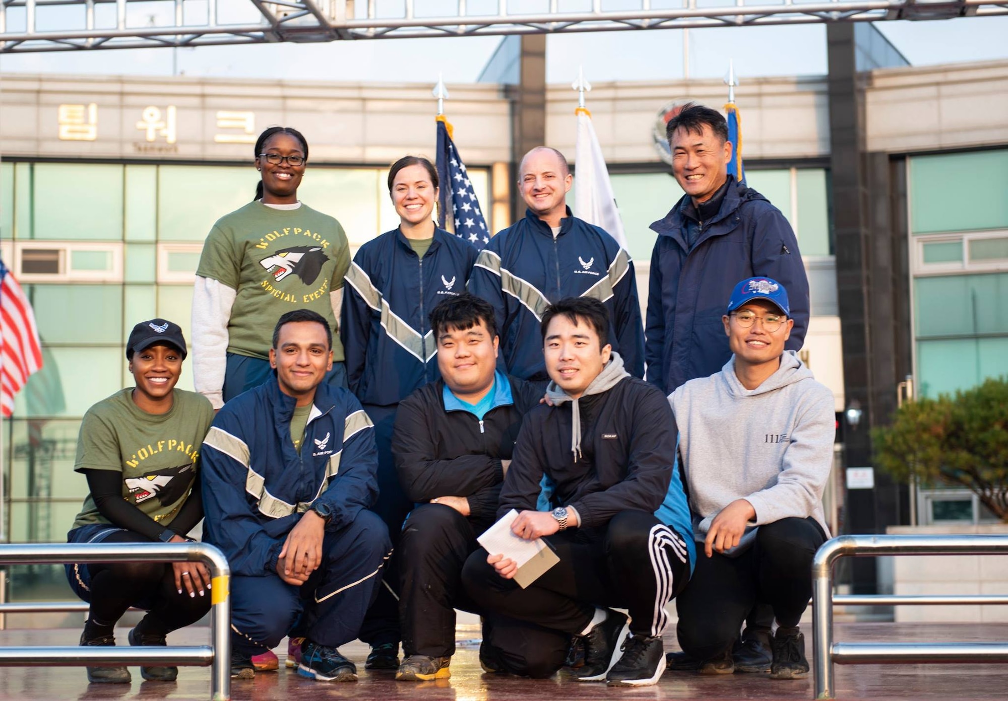 8th Force Support Squadron members pose for a group photo with Col. John Bosone, 8th Fighter Wing commander, and Col. Jae-Gyun Jeon, 38th Fighter Group commander, at Kunsan Air Base, Republic of Korea, Nov. 9, 2018. The US-ROKAF Friendship Day focused on celebrating the partnership and alliance between the 8th Fighter Wing and 38th Fighter Group, who participated in several sporting events and competitions throughout the day. (U.S. Air Force photo by Senior Airman Stefan Alvarez)