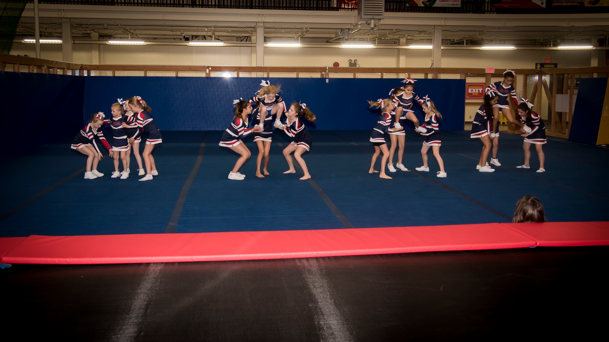 Cheerleaders show off their routine