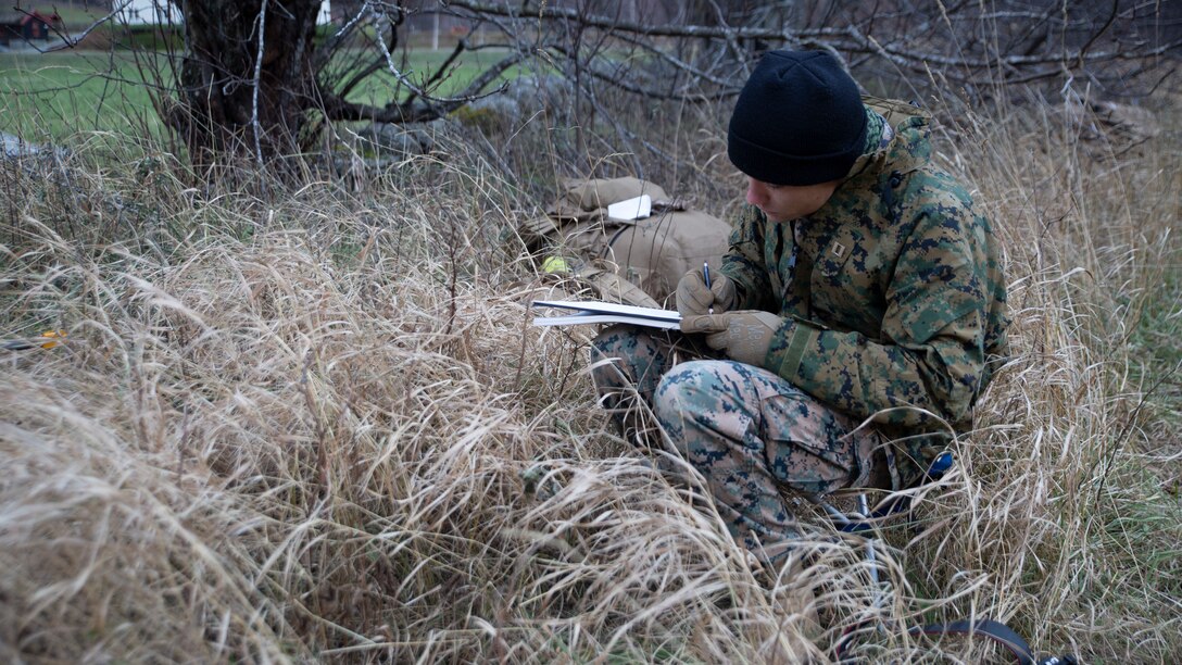 U.S. Marine Corps Capt. Charles J. Baumann, a combat artist with the National Museum of the Marine Corps, sketches a U.S. Marine mortarman and U.S. Navy corpsman with 24th Marine Expeditionary Unit, participating in Exercise Trident Juncture 18, as they post security in a landing zone near Gjøra, Norway, Oct. 31, 2018. Trident Juncture 18 enhances the U.S. and NATO Allies’ and partners’ abilities to work together collectively to conduct military operations under challenging conditions. (U.S. Marine Corps photo by Sgt. Averi Coppa/Released)