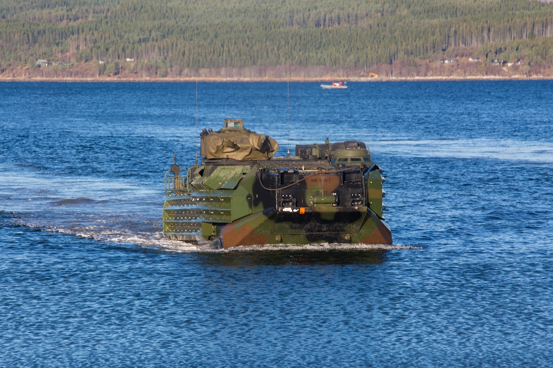 U.S. Marines with 24th Marine Expeditionary Unit conduct an amphibious landing in an Assault Amphibious Vehicle during Exercise Trident Juncture 18 in Alvund, Norway, Oct. 30, 2018.