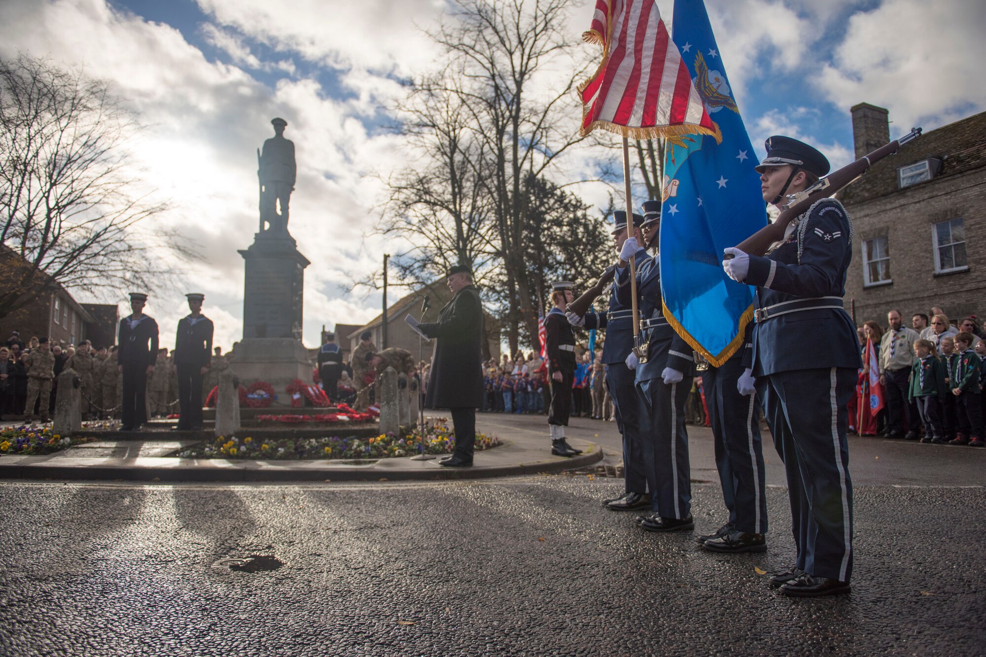 U.S. Air Force Honor Guard Airmen from the 100th Air Refueling Wing participate in a Remembrance Day ceremony in Mildenhall, England, Nov. 11, 2018. Airmen, civic leaders, military cadets and others placed red flower wreaths at the war memorial which symbolizes the lives lost in the poppy fields of Flanders, Belgium, during World War I. (U.S. Air Force photo by Staff Sgt. Christine Groening)