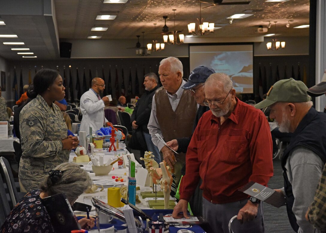 Military retirees visit information booths Nov. 9, 2018, during the Retiree Appreciation Day on Columbus Air Force Base, Mississippi. There are more than 5,700 military retirees in a 50-mile radius of Columbus Air Force Base, Mississippi. (U.S. Air Force photo by Staff Sgt. Joshua Smoot)