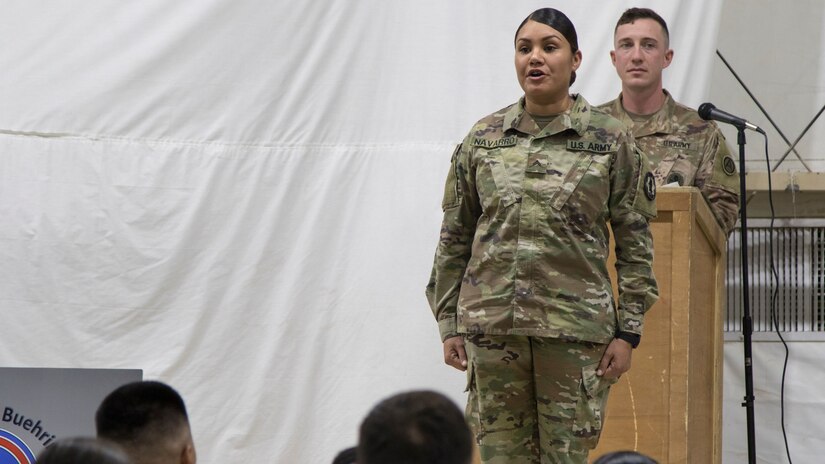 A U.S. Army Soldier graduating from the latest Basic Leader Course at the U.S. Army Central Noncommissioned Officer Academy calls out her name before she walks across the stage at the graduation ceremony held in Camp Buehring, Kuwait, Oct. 17, 2018. Completing BLC is an essential task which prepares Soldiers to be more capable noncomissioned officers.