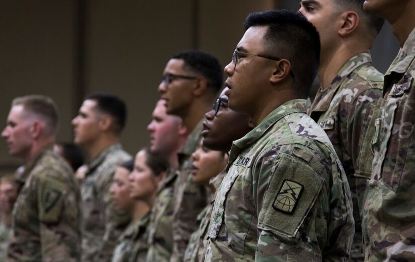 A U.S. Army Soldier recites the Creed of the Noncommissioned Officer at a graduation ceremony for U.S. Army Central Basic Leader Course class 18-170 at Camp Buehring, Kuwait, Oct. 17, 2018. The graduates will return to their deployed units as more capable Soldiers, prepared for leadership positions.